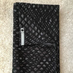 LULULEMON, black and gray patterned scarf.